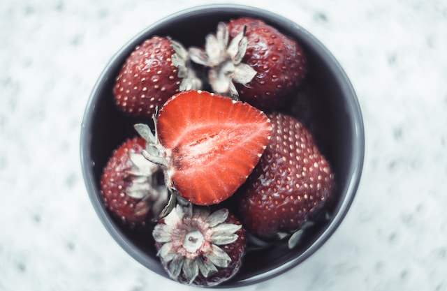 Ways to serve frozen strawberries to your dog